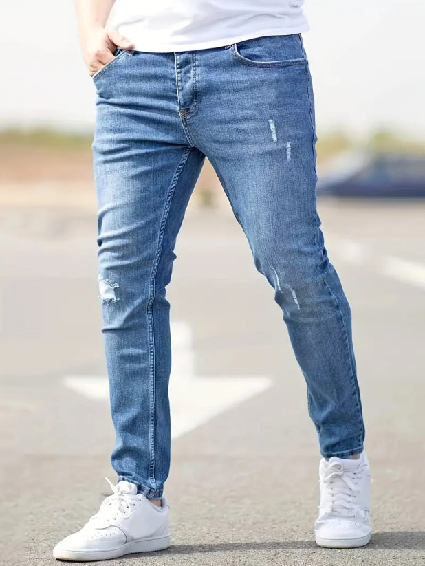 Herrenjeans Skinny-Jeans Fit mit Destroyed-Optik